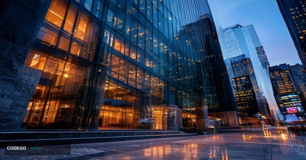 A dramatic cinematic photograph of the modern glass facades of major asset management company headquarters in New York's fina