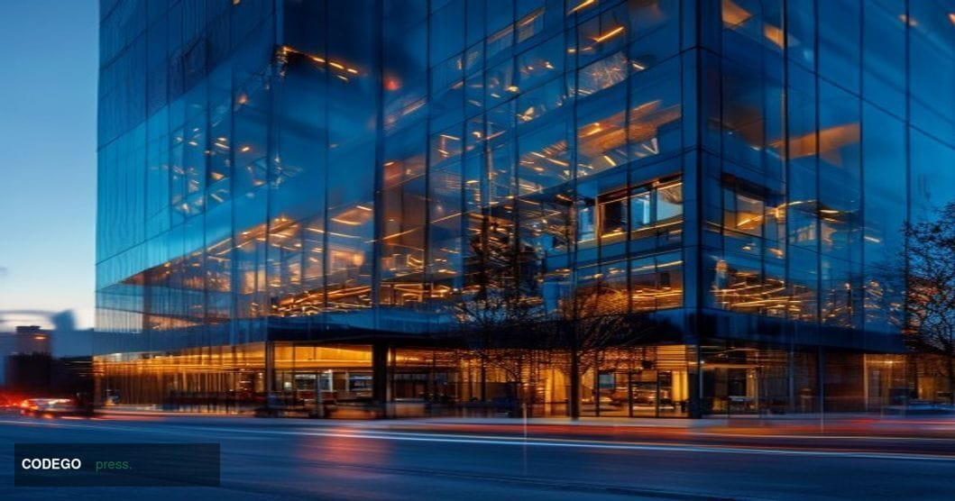 A cinematic editorial photograph showing a modern cryptocurrency trading platform headquarters building at dusk, with warm am