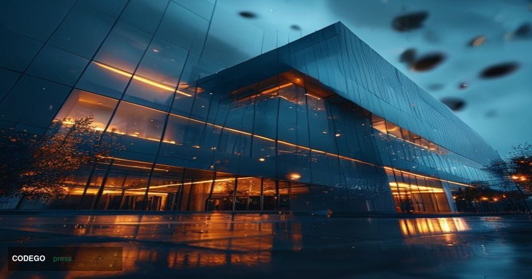 A cinematic editorial photograph showing the exterior of Swan Bitcoin's corporate headquarters at dusk, with dramatic chiaros