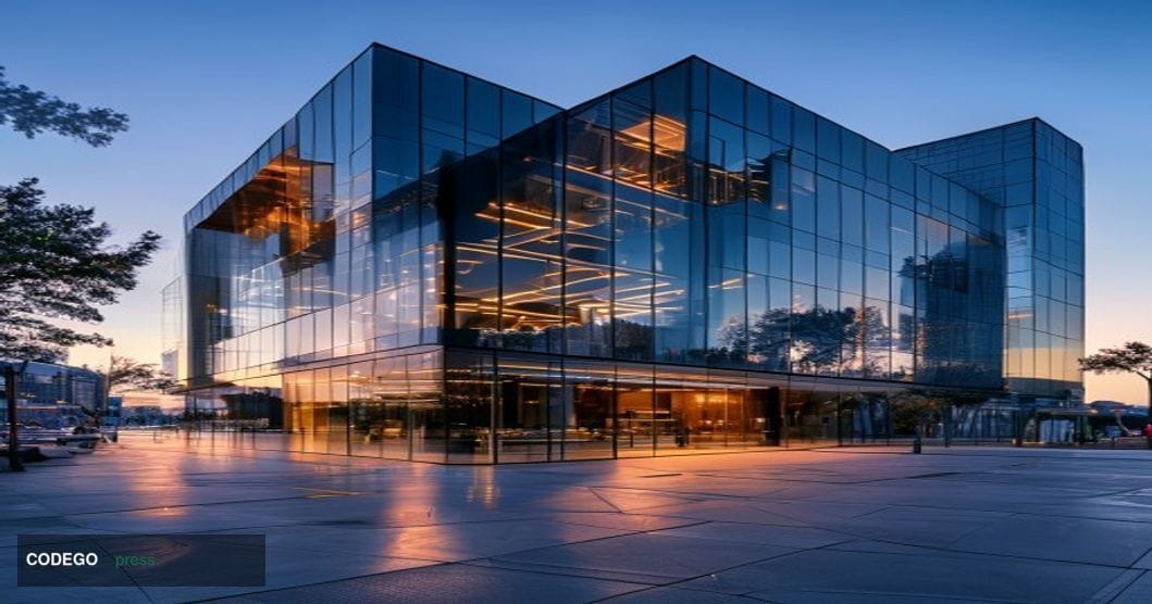 A cinematic editorial photograph of Kraken's San Francisco headquarters building exterior during golden hour, with dramatic c