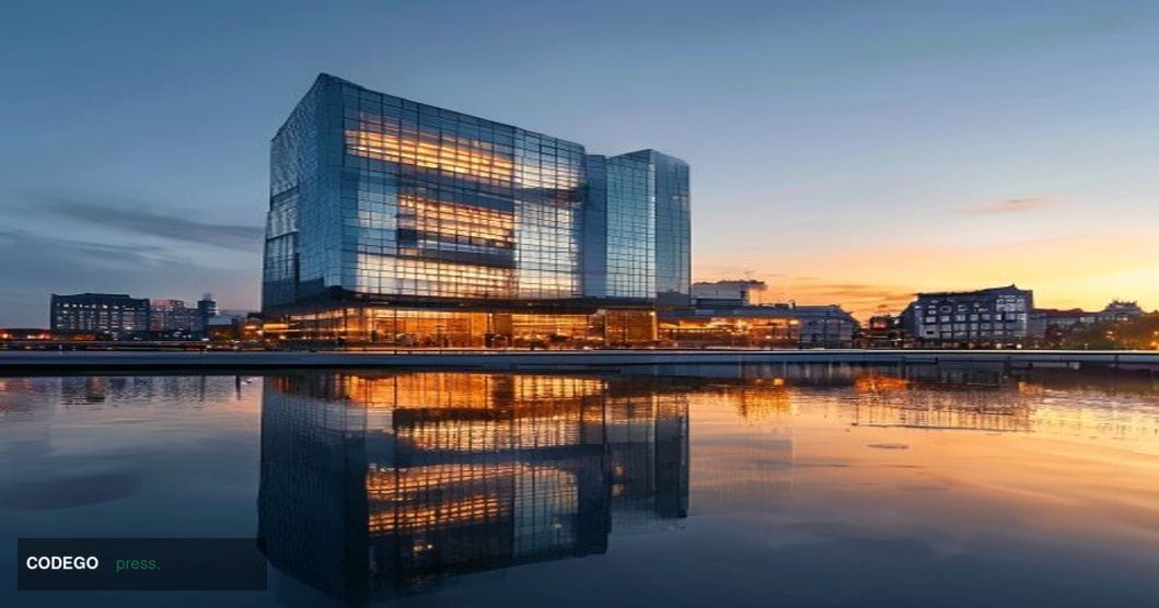 Exterior façade of the European Central Bank headquarters in Frankfurt, Germany, photographed at dawn with warm amber morning