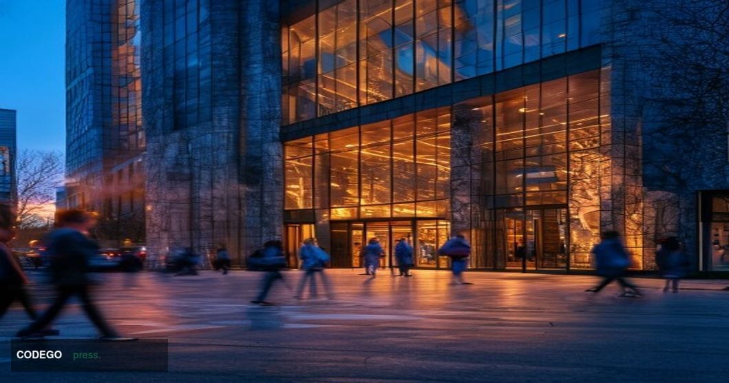 A cinematic editorial photograph of a Huntington Bank branch exterior in Columbus, Ohio, captured at golden hour with warm am