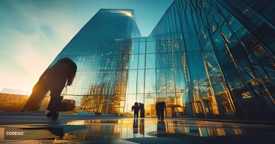 A cinematic editorial photograph taken at ground level looking up at the Coinbase headquarters building exterior in San Franc