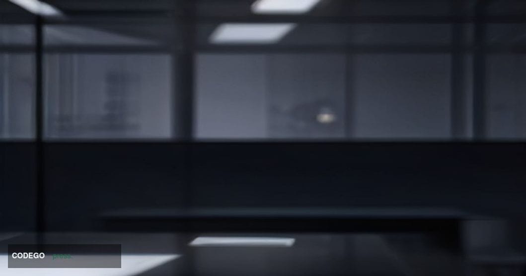 A cinematic editorial photograph of a sleek, minimalist fintech workspace at dusk, shot from a low angle looking up toward fl