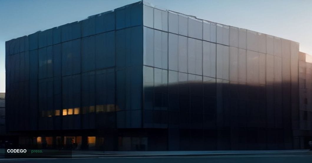 A dramatic cinematic editorial photograph of a sleek glass-and-steel blockchain technology office exterior at dusk, located i