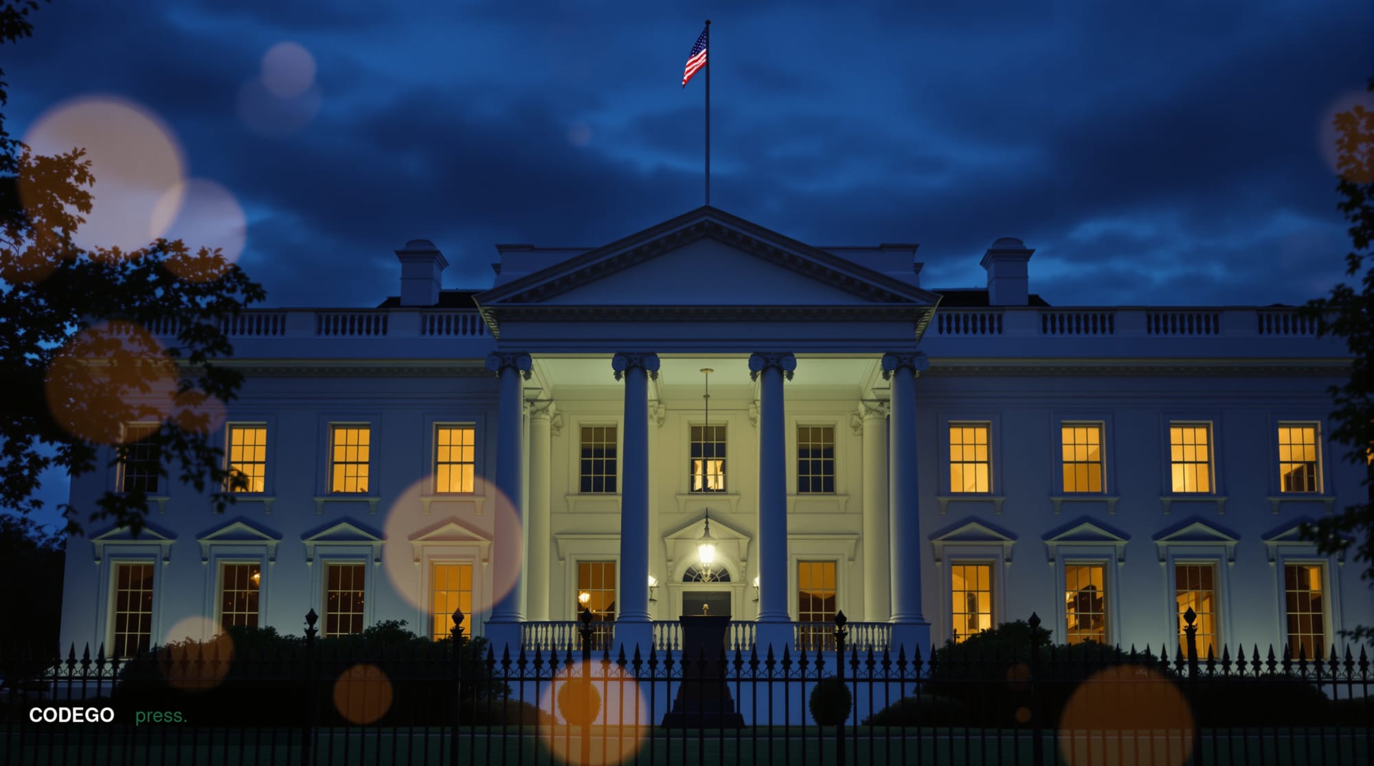 A cinematic editorial photograph of the northwest facade of the White House at dusk, shot from Pennsylvania Avenue at a low a