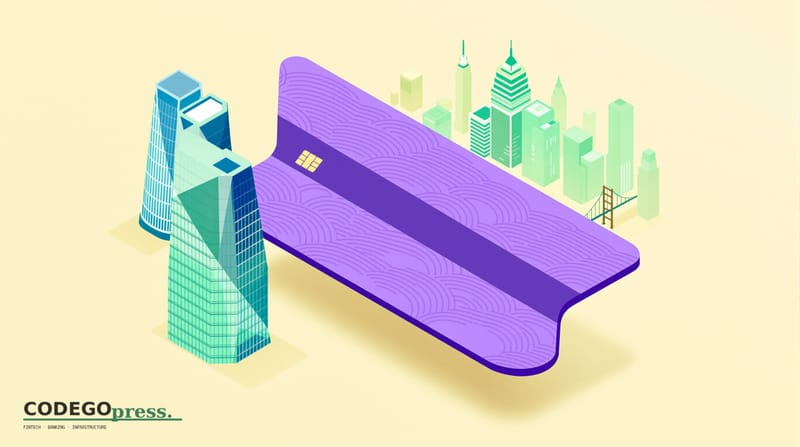 Large embossed payment card with Stripe purple accent stripe in centre, Stripe San Francisco curved-glass HQ on the left, car