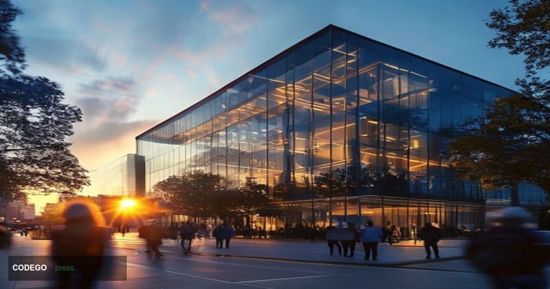 A photorealistic 8K editorial photograph showcasing Anthropic's San Francisco headquarters building exterior with modern glas