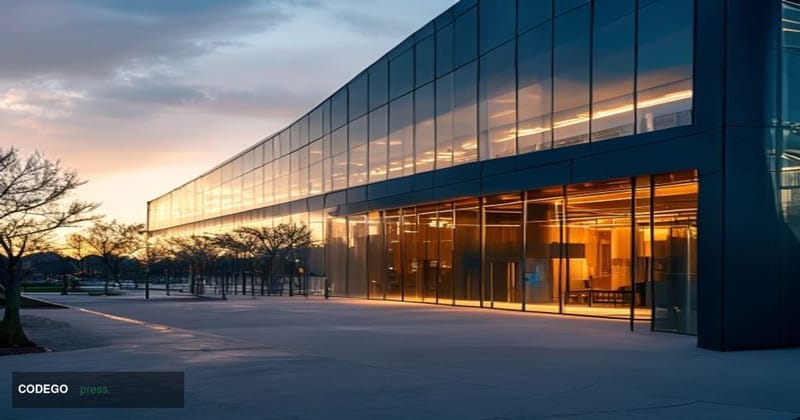 A cinematic editorial photograph of Dell's corporate headquarters in Round Rock, Texas, captured during golden hour with dram