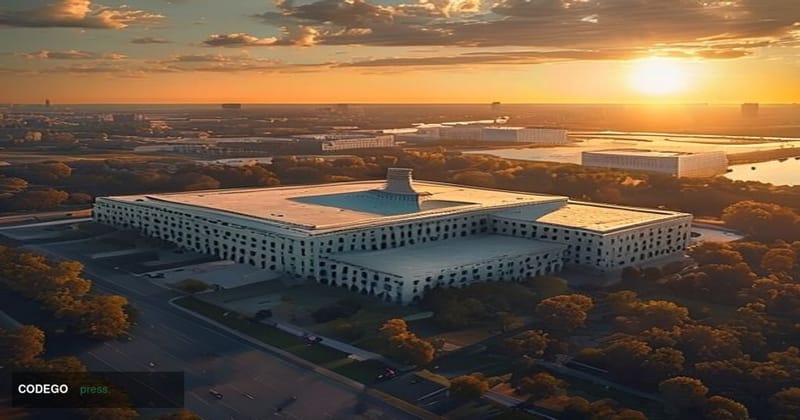 A dramatic overhead aerial view of the Pentagon building in Arlington, Virginia, photographed during golden hour with warm am
