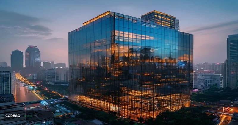 A cinematic editorial photograph showing the modern VPBank headquarters building in Ho Chi Minh City, Vietnam, with its disti