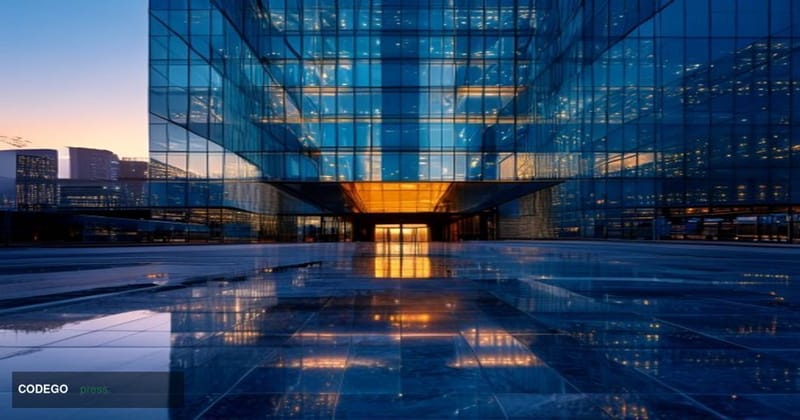 A dramatic cinematic editorial photograph taken at ground level looking up at a modern glass-and-steel financial district tow
