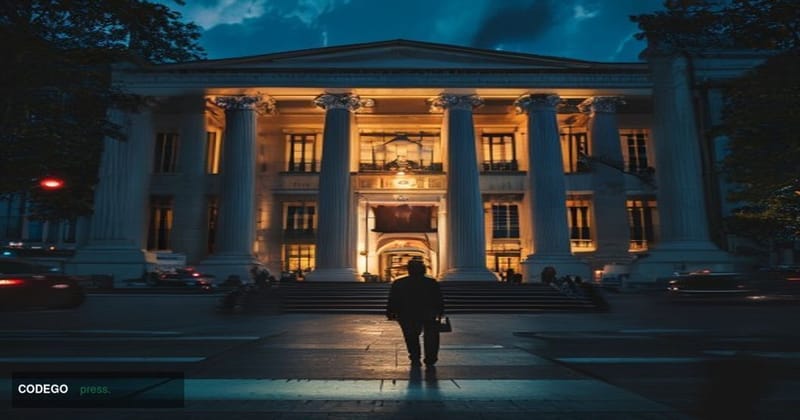 A cinematic editorial photograph taken at dusk outside the Bank Indonesia headquarters in Jakarta, a grand colonial-era white