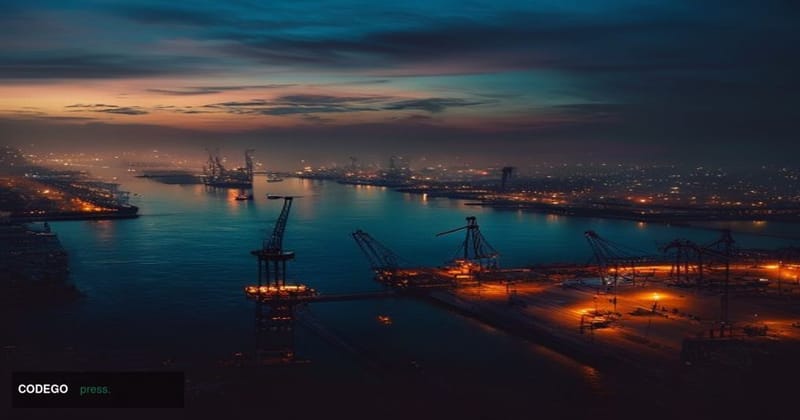 A dramatic cinematic editorial photograph of the Port of Duqm in Oman at twilight, with the vast industrial harbor visible in