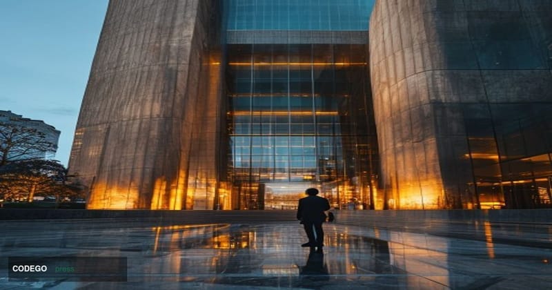 A cinematic editorial photograph of the Reserve Bank of Australia's headquarters in Sydney, captured from a low-angle perspec