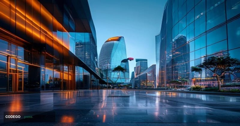 A cinematic editorial photograph shot at ground level looking up at a modern glass-and-steel corporate fintech headquarters i