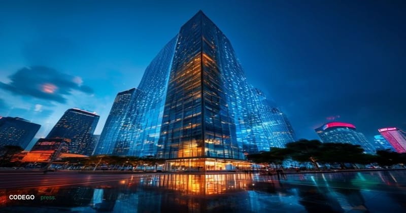 A cinematic editorial photograph of Tencent's gleaming corporate headquarters tower in Shenzhen, China, shot from a low angle