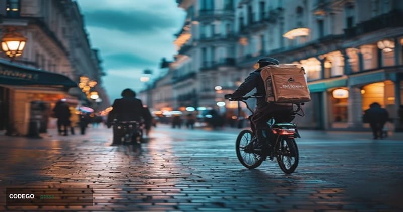 A cinematic editorial photograph taken at a wide angle from street level in a recognizable European urban setting — cobblesto