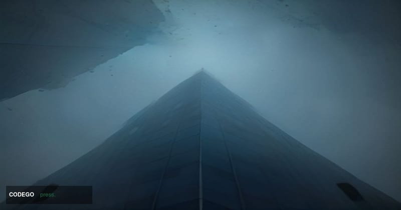 A dramatic cinematic editorial photograph shot at a low angle looking up at PayPal's corporate headquarters building in San J