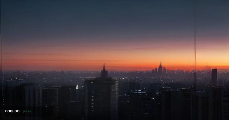 A cinematic editorial photograph shot at golden-hour dusk, depicting a sweeping wide-angle view of a glass-and-steel modern c