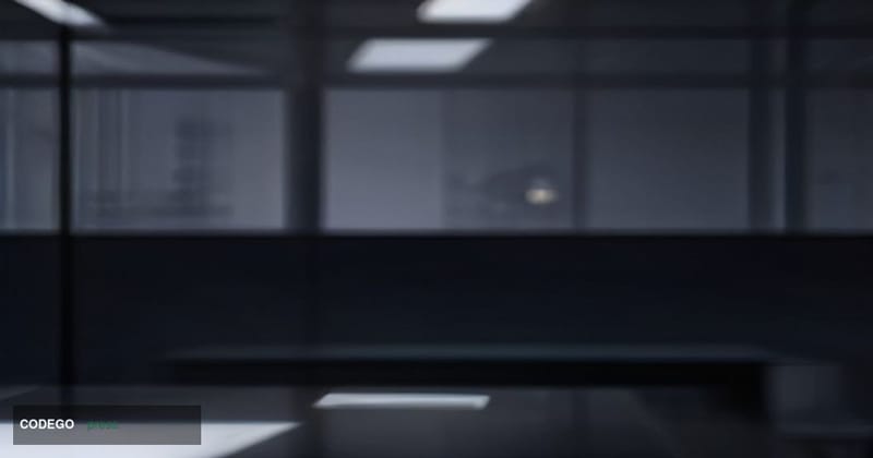 A cinematic editorial photograph of a sleek, minimalist fintech workspace at dusk, shot from a low angle looking up toward fl