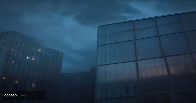 A dramatic cinematic editorial photograph shot from a low angle looking up at a modernist corporate glass-and-steel office ca